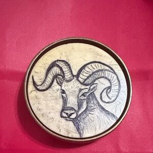 Vintage Ram Ivory scrimshaw with hand-carved ram illustration. BTS 1978 brass